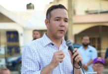 Johnny Pujols muestra imagenes de reunión de Danilo Medina con productores de arroz en 2019 y emplaza al ministro de Agricultura